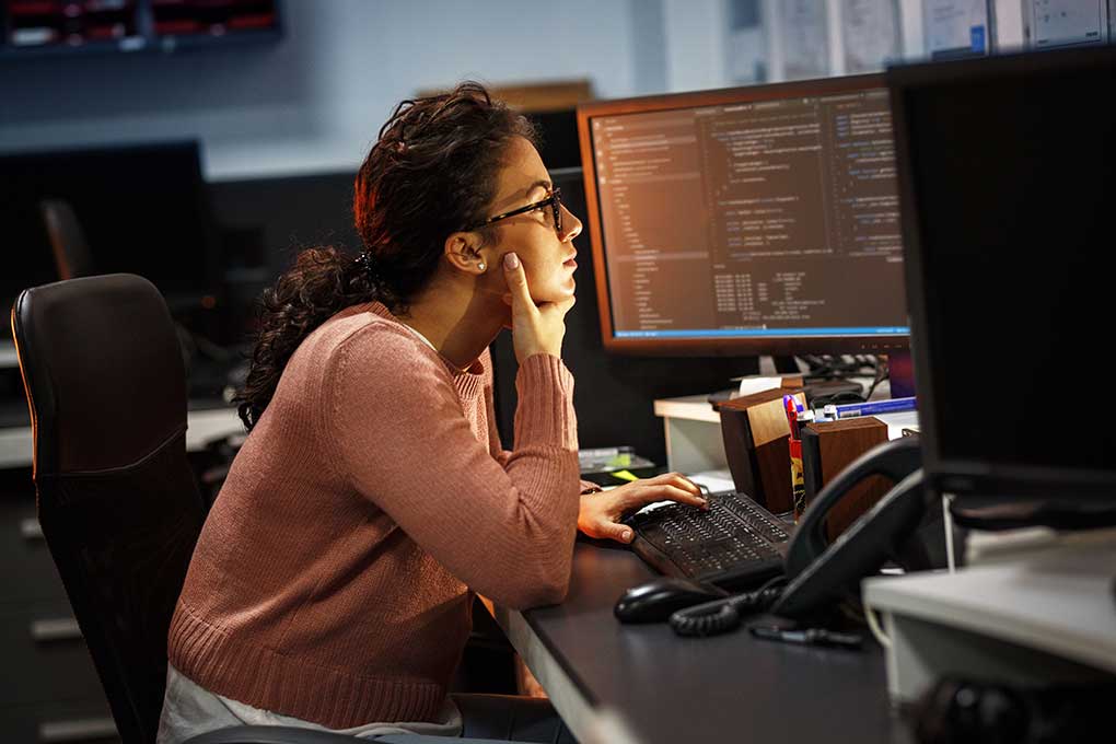 Female programmer working diligently