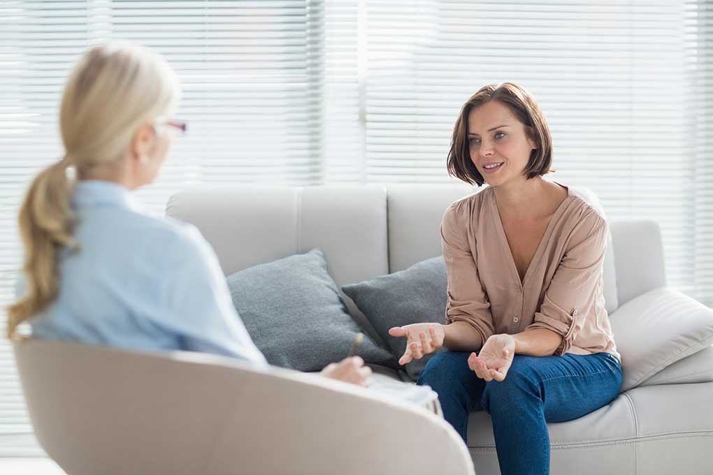 Woman talking to her therapist