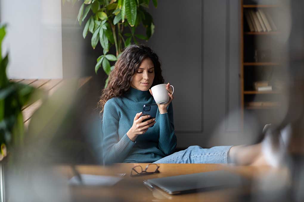 Woman taking a coffee break during work